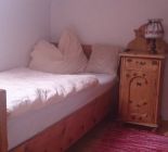 single bed in the apartment house